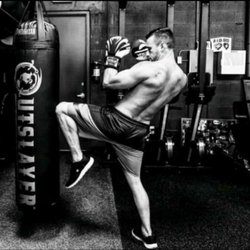 Pinnacle Health & Fitness - Trainer/business owner Jon displaying one of his strengths as he specializes in functional training and boxing/kick boxing technique.