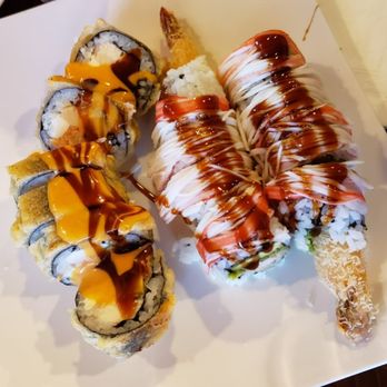 New Sushi Village - Don't remember their names. One was a shrimp tempura roll. - Sushi Bars Near Me - Bayside, New York New Sushi Village - Don't remember their names. One was a shrimp tempura roll. - Sushi Bars Near Me - Bayside, New York