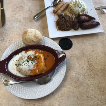 Café Madrid - Lasagna (left), South American Plate (top right). Lunch. - Spanish Near Me - Holladay, Utah Café Madrid - Lasagna (left), South American Plate (top right). Lunch. - Spanish Near Me - Holladay, Utah