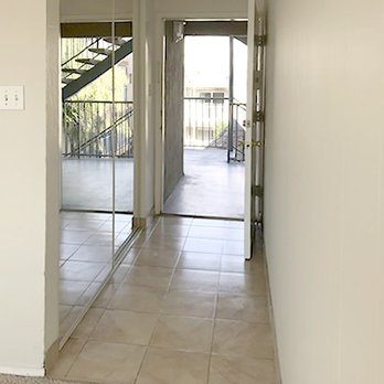 New Brighton Place - Living entry and large coat closet with mirrored doors - Apartments Near Me - Albany, California New Brighton Place - Living entry and large coat closet with mirrored doors - Apartments Near Me - Albany, California
