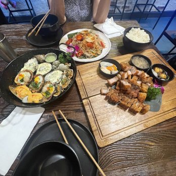 HEM Kitchen And Bar - Seafood combo platter, papaya salad, crispy pork belly. - Vietnamese Near Me - Houston, Texas