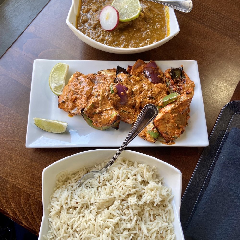 Traditional fish curry (tilapia) and salmon tikka! So so good!! Traditional fish curry (tilapia) and salmon tikka! So so good!!