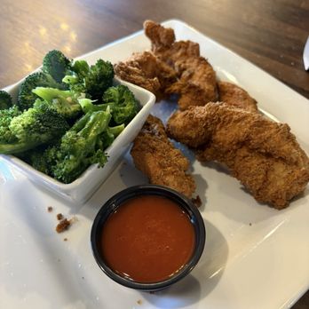 Blackwater Restaurant & Lounge - Fried tender with buffalo and steamed broccoli. - New American Near Me - Chillicothe, Missouri Blackwater Restaurant & Lounge - Fried tender with buffalo and steamed broccoli. - New American Near Me - Chillicothe, Missouri