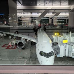Flight delayed with limited/no updates for 1.5 hours. Flight crew showed up 1 hour late from original departure time. Flight delayed with limited/no updates for 1.5 hours. Flight crew showed up 1 hour late from original departure time.
