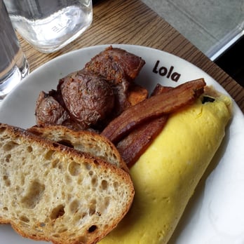 Lola - Omlette for $16. Bacon is heavenly. - Greek Near Me - Seattle, Washington