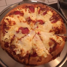 Small pizza with pepperoni and ricotta cheese