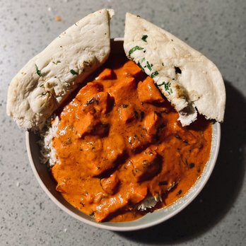 Curry Gate - Chicken Tikka Masala, Spice Level 5 (out of 10), comes with medium-sized rice Garlic Naan Bread side, 4 big pieces - Indian Near Me - Charlotte, North Carolina Curry Gate - Chicken Tikka Masala, Spice Level 5 (out of 10), comes with medium-sized rice Garlic Naan Bread side, 4 big pieces - Indian Near Me - Charlotte, North Carolina
