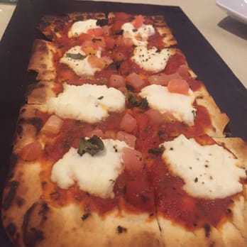 The Porch - Flatbread with fresh mozzarella and tomato. Tasty. - New American Near Me - Lansdale, Pennsylvania The Porch - Flatbread with fresh mozzarella and tomato. Tasty. - New American Near Me - Lansdale, Pennsylvania