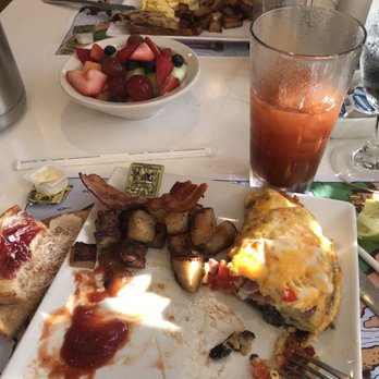 Old Captiva House - Breakfast; OCH omelette with perfect made home fries; OJ, and fruit bowl. - New American Near Me - Captiva, Florida