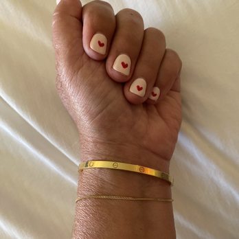 Tranquility Nails Spa - Mani with pale pink and hearts - Nail Salons Near Me - Del Mar, California Tranquility Nails Spa - Mani with pale pink and hearts - Nail Salons Near Me - Del Mar, California