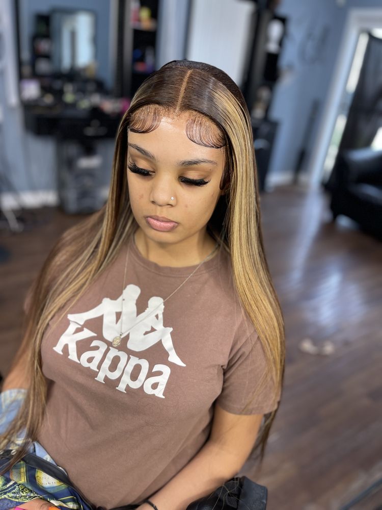 Continuous slay hair boutique Logo
