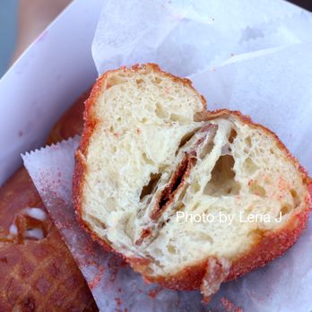 Leonard's Bakery - Li Hing Malasada ($2.00) - texture is nice and fluffy, but the Li Hing powder outside is not good. - Bakeries Near Me - Honolulu, Hawaii Leonard's Bakery - Li Hing Malasada ($2.00) - texture is nice and fluffy, but the Li Hing powder outside is not good. - Bakeries Near Me - Honolulu, Hawaii