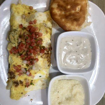 Jimmy's Egg - ~03-19-21~Durant, Oklahoma - Conquistador Omelette, Gravy, Grits and Biscuit. - Breakfast & Brunch Near Me - Durant, Oklahoma