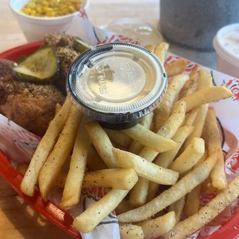 Eugene's Hot Chicken - Lemon Pepper Leg Quarter (ranch), Sautéed Corn, French Fries....Banana Pudding (lid still on cup) - Food Trucks Near Me - Birmingham, Alabama Eugene's Hot Chicken - Lemon Pepper Leg Quarter (ranch), Sautéed Corn, French Fries....Banana Pudding (lid still on cup) - Food Trucks Near Me - Birmingham, Alabama