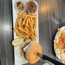 Harbourview Marina Café - 7 ounce Swiss and mushroom burger special with fries as a side. I ordered the mushrooms and pickle on the side.