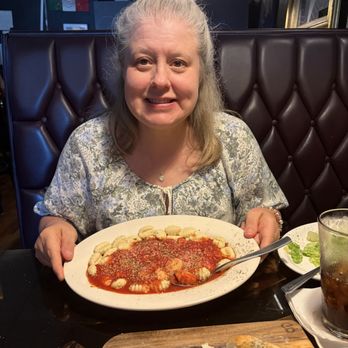 Figaretti's Restaurant - Gnocchi in traditional sauce. - Italian Near Me - Wheeling, West Virginia Figaretti's Restaurant - Gnocchi in traditional sauce. - Italian Near Me - Wheeling, West Virginia
