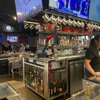 Old Chicago Pizza + Taproom - Bar Area - very clean and well stocked! - Pizza Near Me - Hays, Kansas