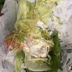 Jimmy John's - I ordered a #4 Turkey Tom unwich. This is what I received. Literally one piece of turkey, mixed with brown lettuce. Ridiculous.