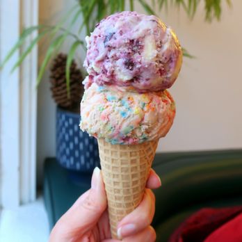 Kind Ice Cream - a hand holding a cone of ice cream - Ice Cream & Frozen Yogurt Near Me - Edmonton, Alberta