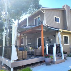 OuterSpace Decks - We opted for the wood-stained beam vs. a painted beam to provide contrast and keep the deck as maintenance-free as possible.