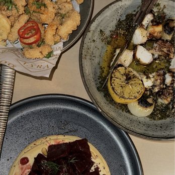 LÝRA - Bottom: Hummus & Charred Beets Right: Grilled Octopus* Left: Crispy Calamari - Greek Near Me - Chicago, Illinois