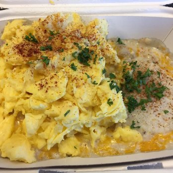 Biscuit Bitch - Gritty scrambled cheese bitch... biscuit and gravy, cheese, eggs, and grits - Breakfast & Brunch Near Me - Seattle, Washington