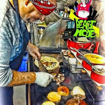 Beast Mode - a man preparing food on a grill - Food Trucks Near Me - Huntsville, Alabama