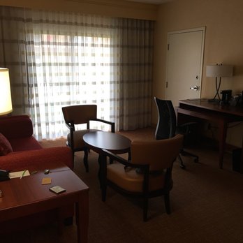 Courtyard by Marriott Raleigh Midtown - King suite living room area - Hotels Near Me - Raleigh, North Carolina Courtyard by Marriott Raleigh Midtown - King suite living room area - Hotels Near Me - Raleigh, North Carolina