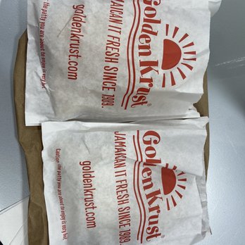 Golden Krust Caribbean Restaurant - two bags of food - Caribbean Near Me - Hollywood, Florida