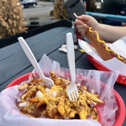 Chili cheese fries and a corn dog Chili cheese fries and a corn dog