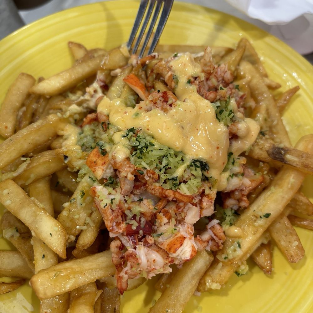 Sunset Grille & Raw Bar - Garlic Parmesan lobster fries - Sushi Bars Near Me - Duck, North Carolina Sunset Grille & Raw Bar - Garlic Parmesan lobster fries - Sushi Bars Near Me - Duck, North Carolina