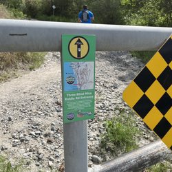 Three Blind Mice - Small sign marking the entrance to the course.
