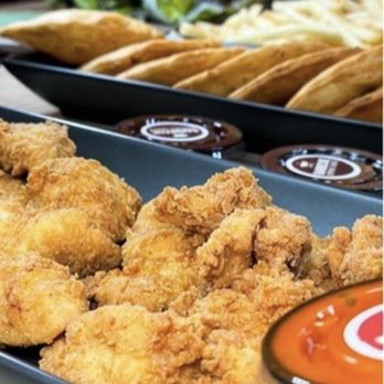 Pollo Campero - a tray of fried chicken with dipping sauce - Chicken Shop Near Me - Santa Ana, California Pollo Campero - a tray of fried chicken with dipping sauce - Chicken Shop Near Me - Santa Ana, California
