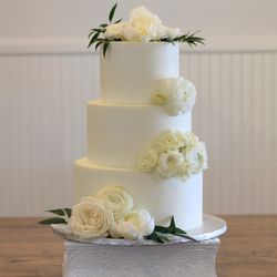 Love + Sugar - Three-tier wedding cake with smooth sides and sharp edges. Decorate with fresh flowers at The Springs in Anna, TX.