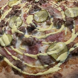 CARL THE CUBAN (DDD) 12-hour citrus-Cuban pork, shaved ham, house cheese, dill pickles, & French's mayo.**
