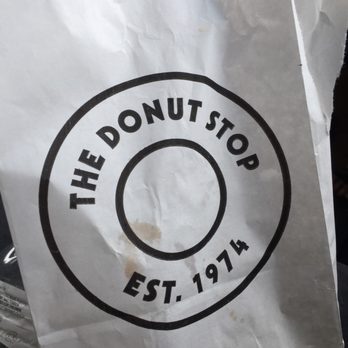 Donut Stop - the donut shop logo on a paper bag - Donuts Near Me - Amarillo, Texas