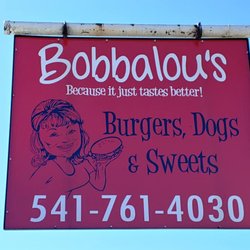 Bobbalou's Burgers & Dogs - Here's the sign to look for! Red as your headed from the Rogue Valley to the beach, yellow from the beach to the Rogue Valley.