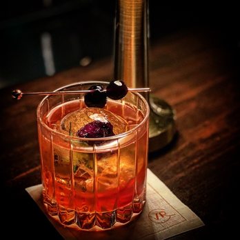 The Vine Room - Old Fashioned with a rose Ice cube and delicious luxardo cherries - Speakeasies Near Me - Naples, Florida The Vine Room - Old Fashioned with a rose Ice cube and delicious luxardo cherries - Speakeasies Near Me - Naples, Florida
