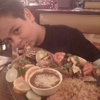 Vallarta Restaurant - My son kissing his poor fried pescado. - Mexican Near Me - San Leandro, California Vallarta Restaurant - My son kissing his poor fried pescado. - Mexican Near Me - San Leandro, California