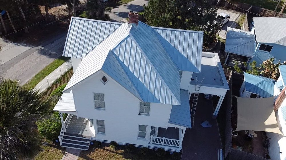 Slide of Pinnacle Roofing Group