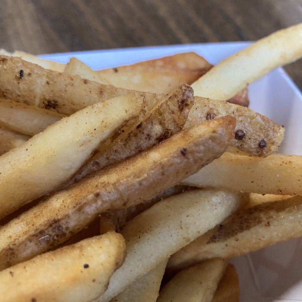 PIZZA KARMA | Food Truck Catering - Eden Prairie - Masala Fries, close-up. - Pizza Near Me - Eden Prairie, Minnesota PIZZA KARMA | Food Truck Catering - Eden Prairie - Masala Fries, close-up. - Pizza Near Me - Eden Prairie, Minnesota
