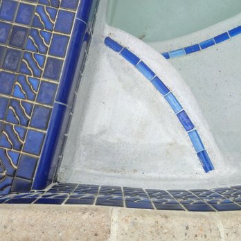 Seabreeze Pools of Brevard - Grout missing from tiles in corner causing leakage - Pool & Hot Tub Service Near Me Seabreeze Pools of Brevard - Grout missing from tiles in corner causing leakage - Pool & Hot Tub Service Near Me