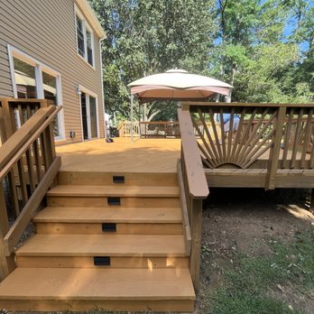 Madany Contracting - Deck with the Angled Cuts finally got a staining. Mr. Blue was very happy with the final result! - Decks & Railing Near Me - Fredericksburg, Virginia Madany Contracting - Deck with the Angled Cuts finally got a staining. Mr. Blue was very happy with the final result! - Decks & Railing Near Me - Fredericksburg, Virginia