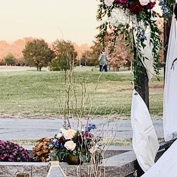 The Flower Stop - Outdoor arbor and ceremony area for our son's fall wedding- the colors were amazing! - Florists Near Me - St. Charles, Missouri