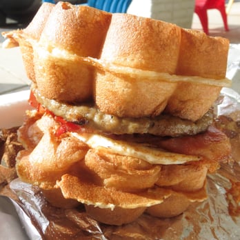 T&J Waffles - Eggs, Bacon and Sausage in a French waffle sandwich all put together - Breakfast & Brunch Near Me - Laurel, Maryland T&J Waffles - Eggs, Bacon and Sausage in a French waffle sandwich all put together - Breakfast & Brunch Near Me - Laurel, Maryland