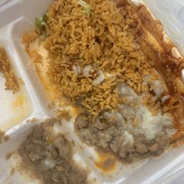 Tostada and enchilada with rice and beans Tostada and enchilada with rice and beans