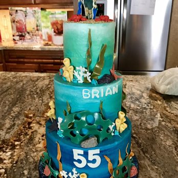 CC's Sweet Sensations - The top of the cake is a picture of my boyfriend in his scuba gear - Bakeries Near Me - Glendale, Arizona