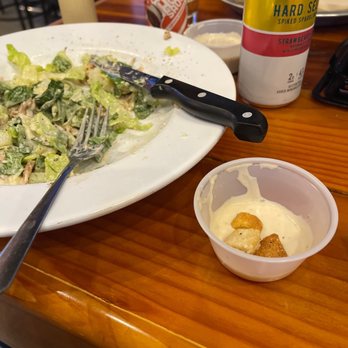 Hootie's Burger Bar - a plate of salad and a fork - Food Delivery Services Near Me - Memphis, Tennessee Hootie's Burger Bar - a plate of salad and a fork - Food Delivery Services Near Me - Memphis, Tennessee