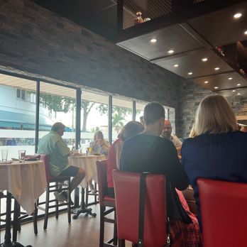 Oak & Ember Steakhouse - Busy but got even busier by 6pm. If you live around here there's a free tram to other places as well. Great if u drink.. - Steakhouses Near Me - Stuart, Florida Oak & Ember Steakhouse - Busy but got even busier by 6pm. If you live around here there's a free tram to other places as well. Great if u drink.. - Steakhouses Near Me - Stuart, Florida