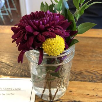 Kitchen Mouse Cafe - Fresh floral arrangements on table - Vegan Near Me - Los Angeles, California
